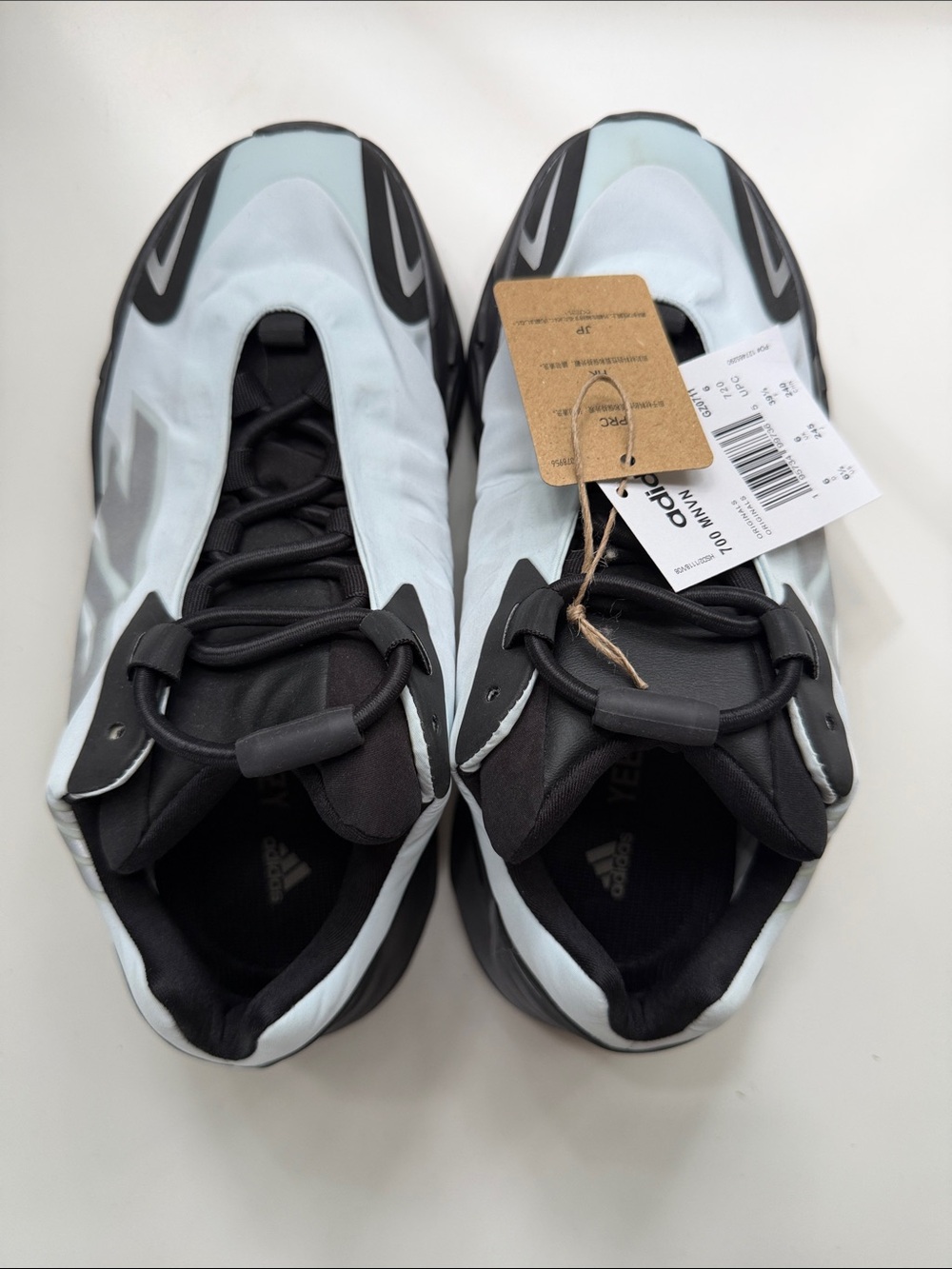 adidas yeezy MNVN Foam Runner-Inspired Sneakers in Pale Blue and Black